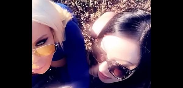  Two hot pornstars suck off a lucky fan in a public park